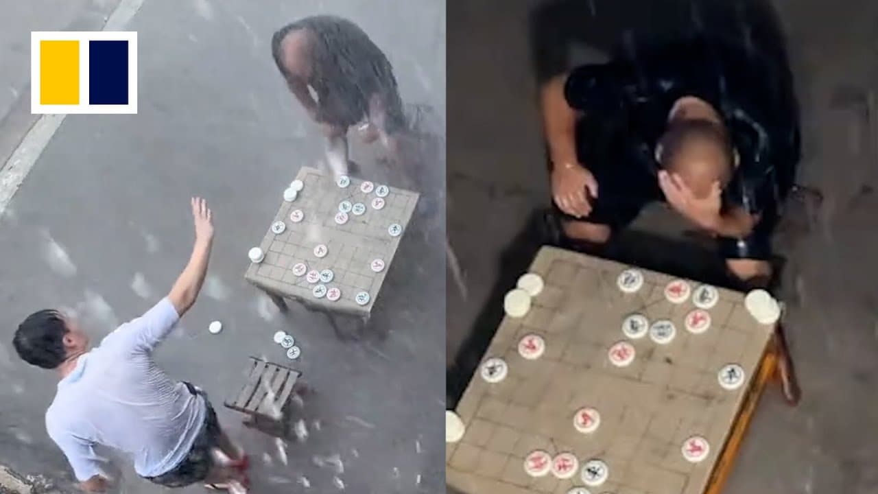 Chinese man loses in chess then analyses game for 4 hours in rain