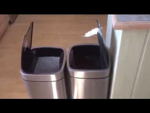Dad laughing at talking robot bins