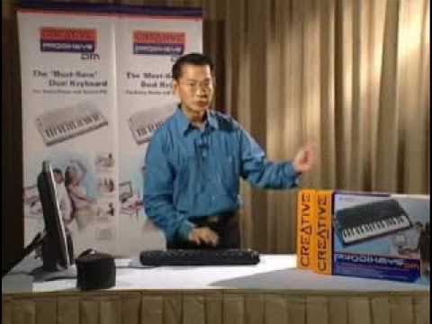 Asian Guy Plays Drums On A Keyboard