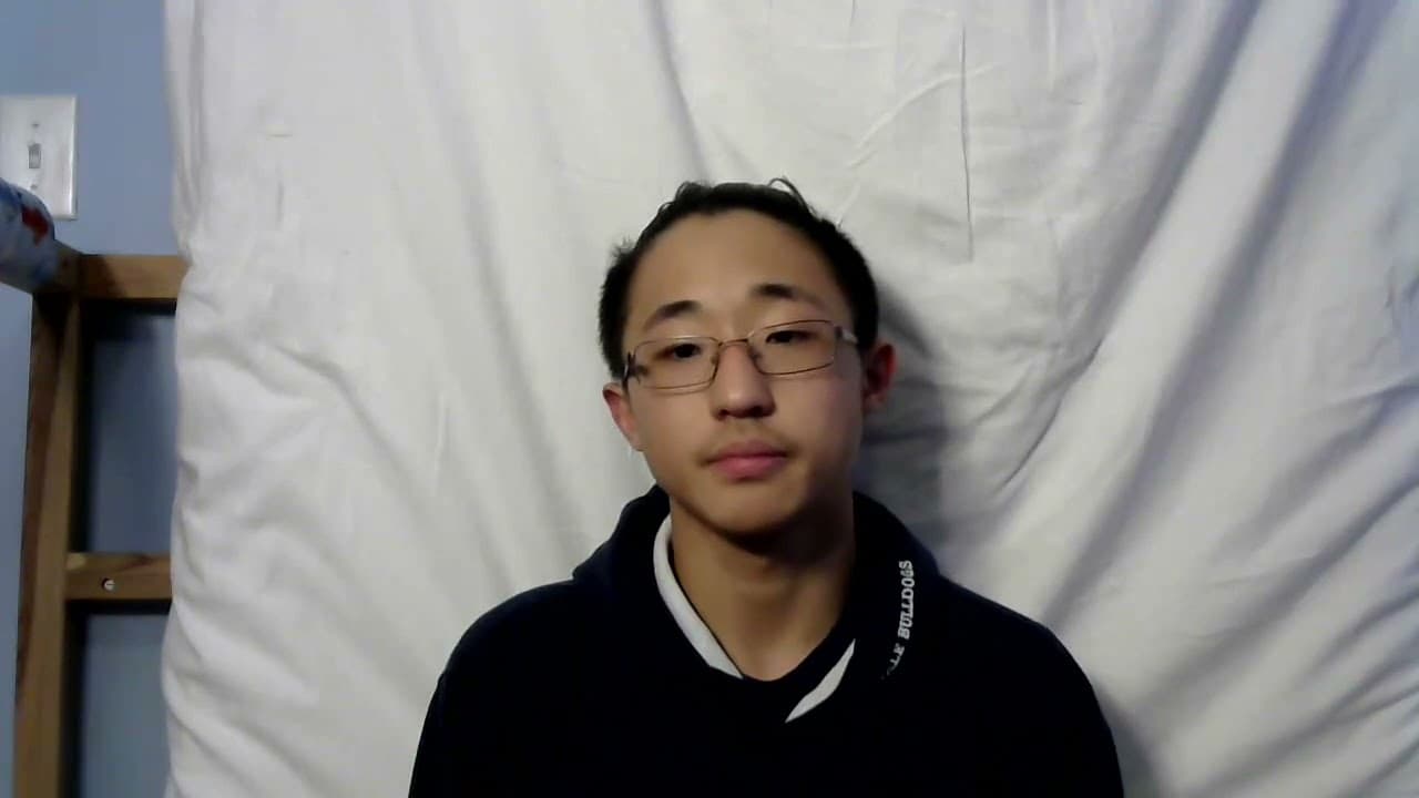 Mattress in Background Falls on Guy as He Leans Forward - 1188173